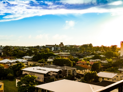 Image from a balcony looking over Brisbane suburb of houses and apartments