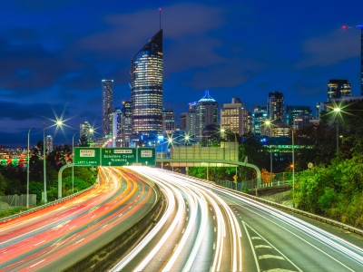 Report thumbnail: night scene of Brisbane with traffic trails